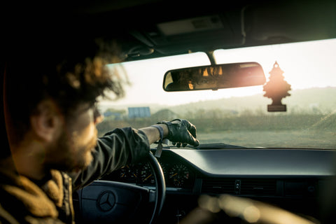 man in car